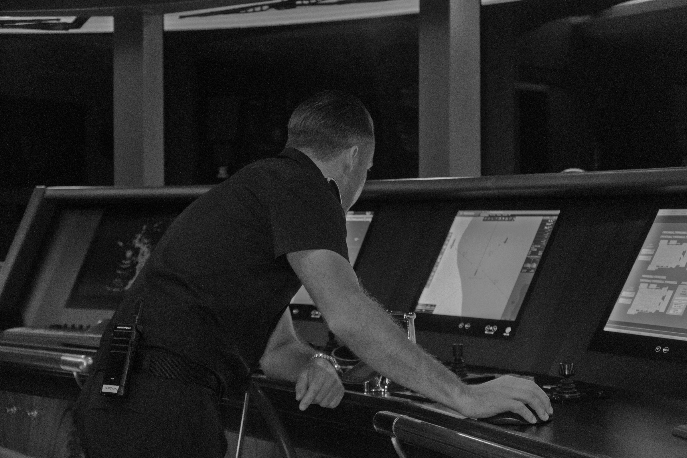 Avalon's captain at the bridge monitoring navigation systems