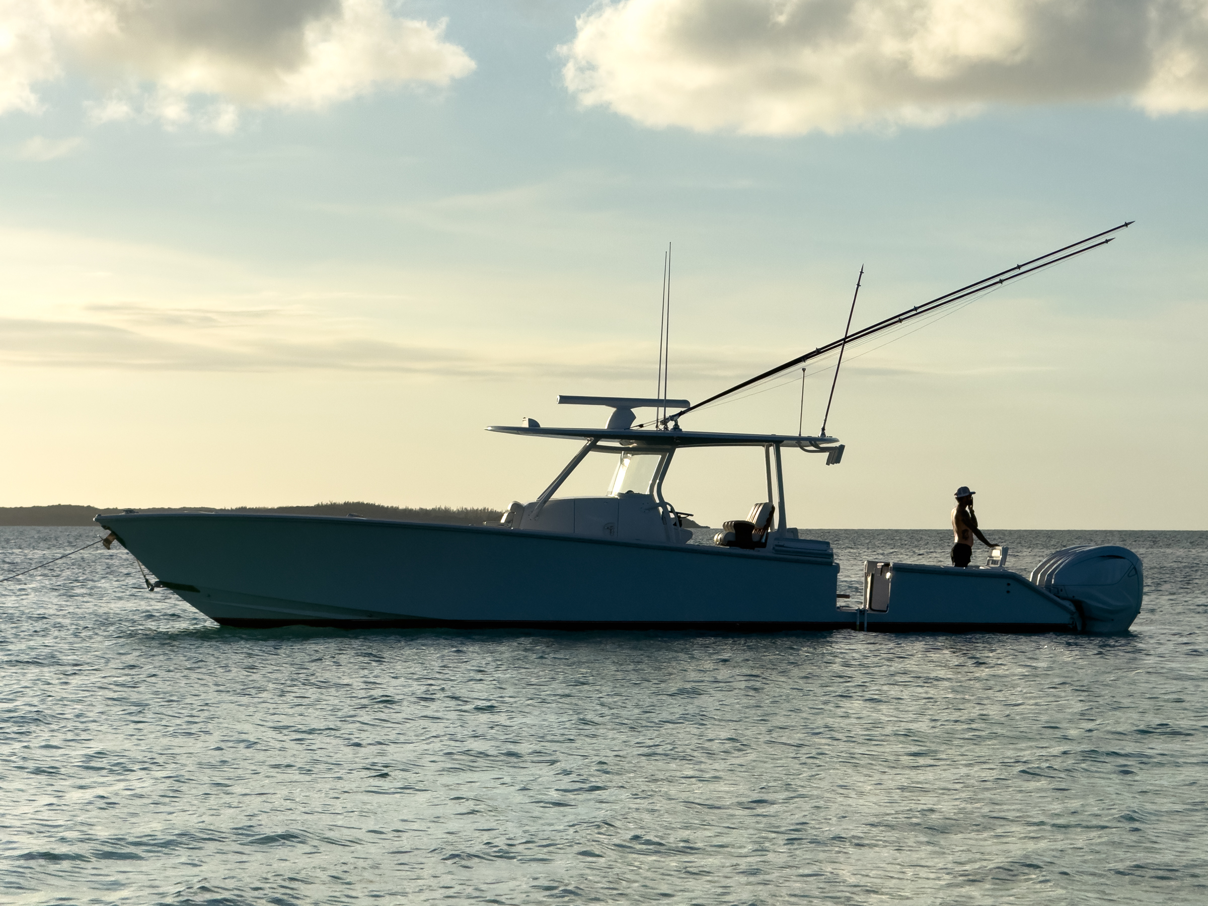Avalon's center-console tender rigged for sportfishing at sunset